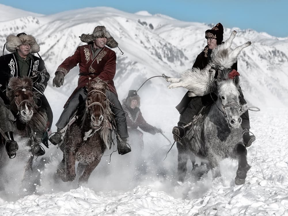 Winter Horsemen Racing by BJ Yang — canvas wall art
