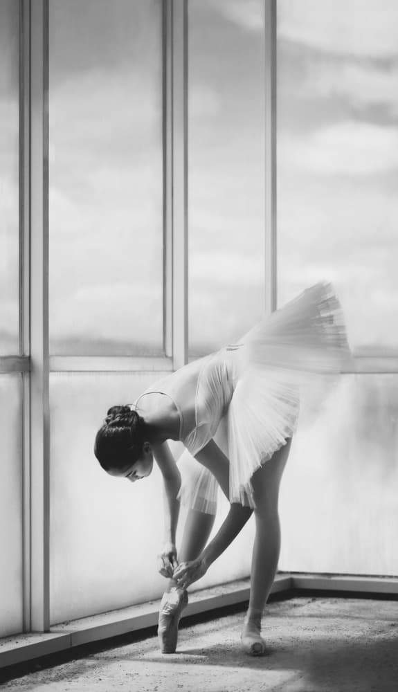 Ballerina Tying Pointe Shoes by Sebastian Kisworo — canvas wall art