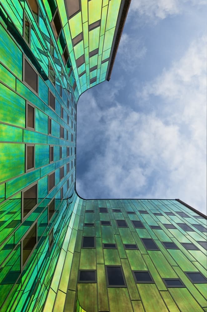 Vibrant Green Building by Leon — canvas wall art