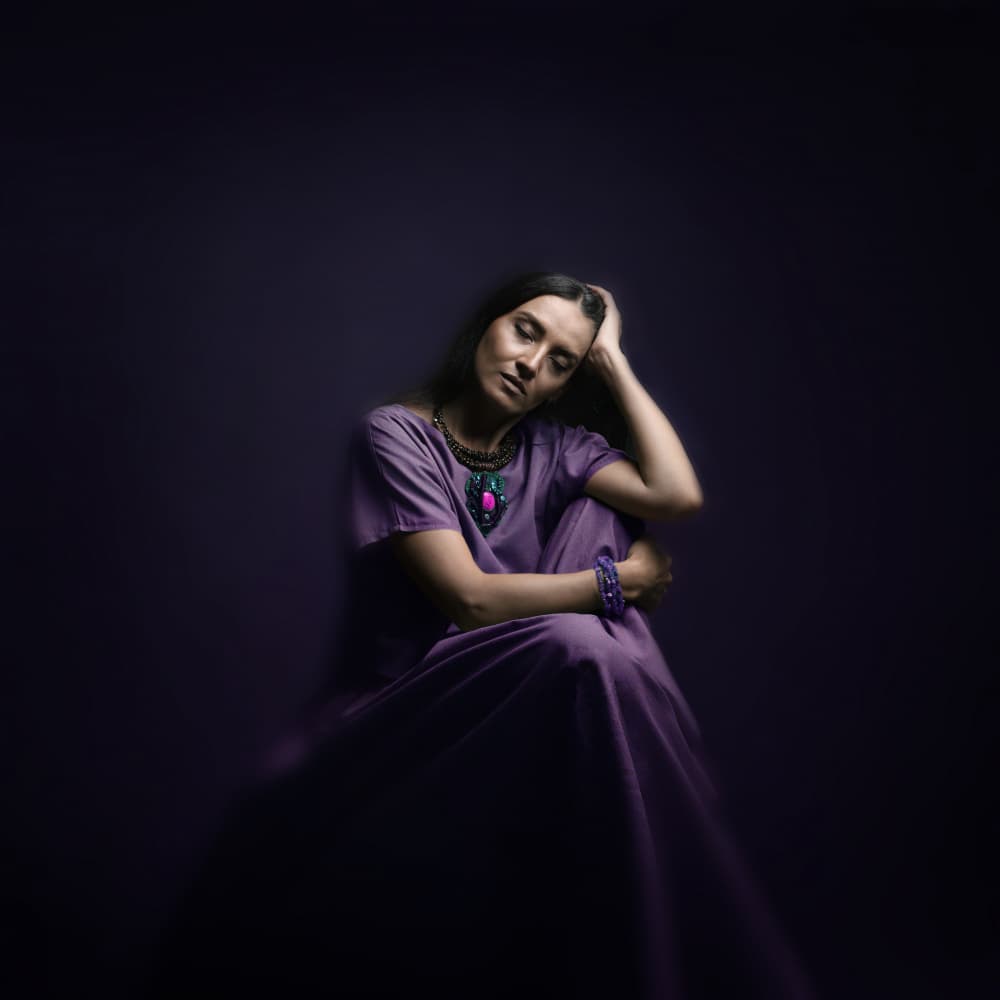 Pensive Woman in Purple by Moein Hasheminasab — canvas wall art