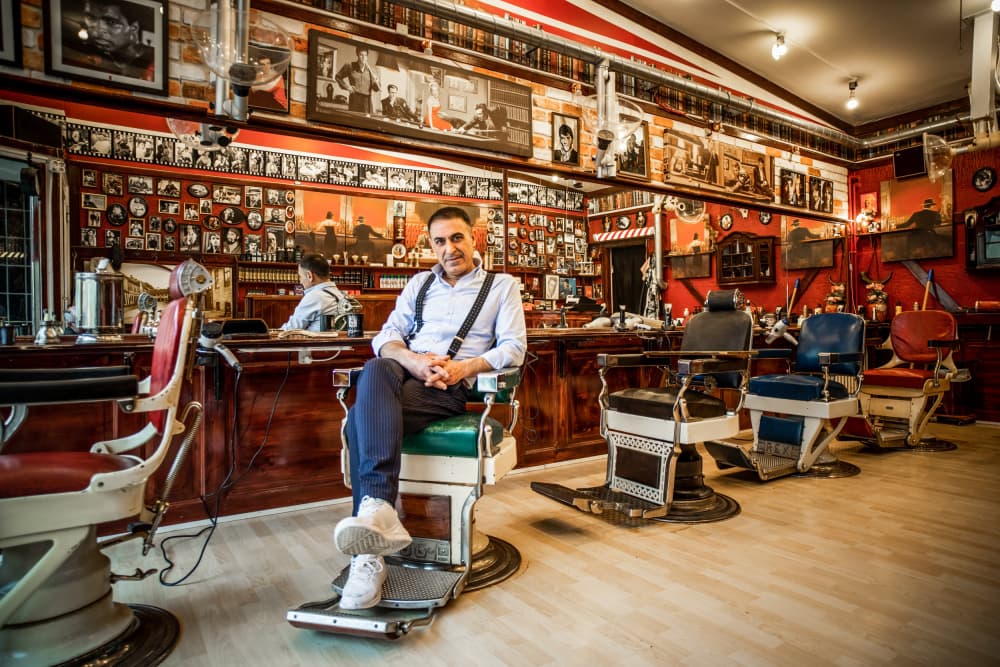 Isan and his barbershop by Lars Hylleberg — canvas wall art