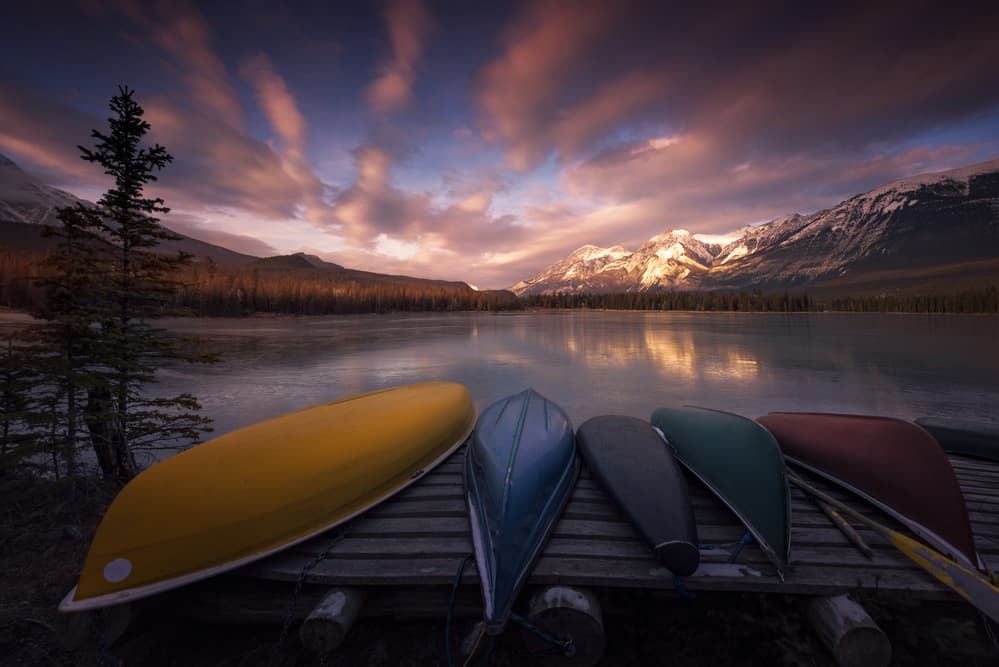 Sunrise Lake Canoes by David Martin Castan — canvas wall art