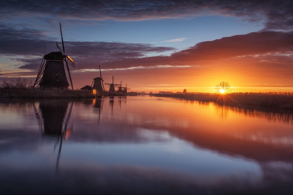 Kinderdijk Sunset Reflections by Miguel Pascual — canvas wall art