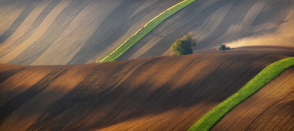 Rolling Hills Tractor Farm by Ales Komovec — canvas wall art