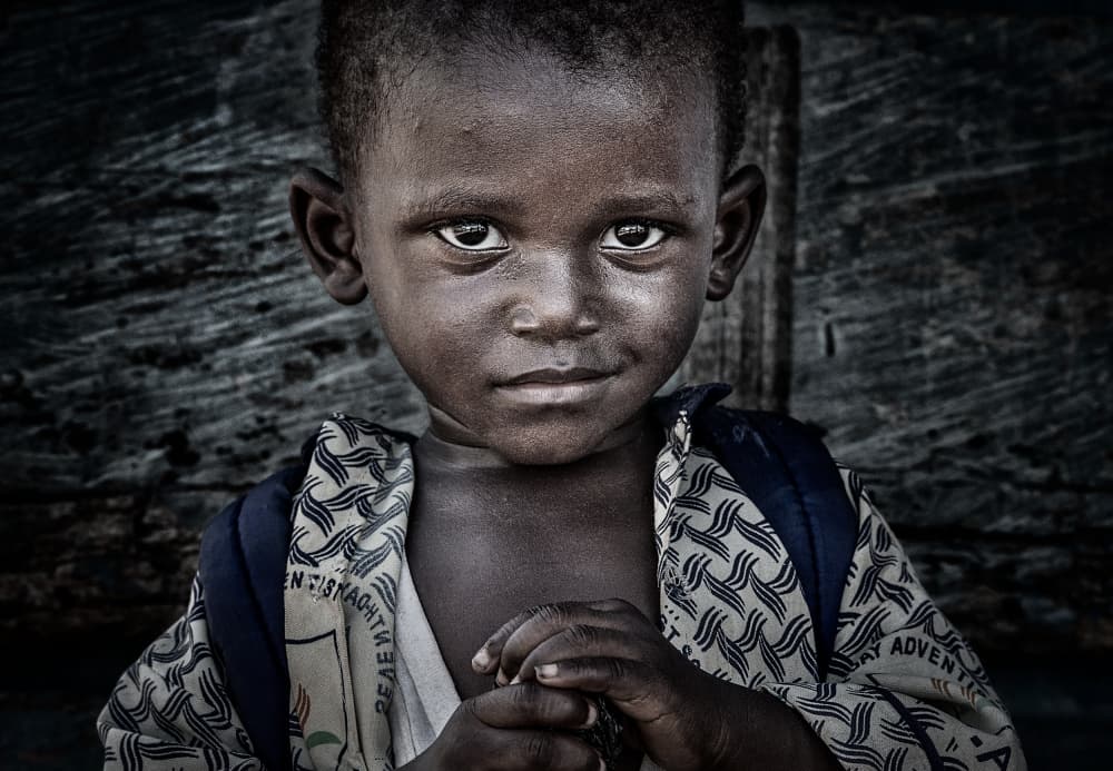 Young African Boy Portrait by Joxe Inazio Kuesta Garmendia — canvas wall art