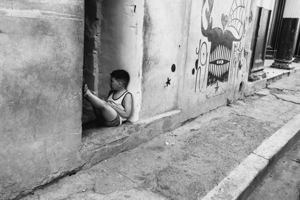 Boy in Urban Corner by Ken Frank — canvas wall art