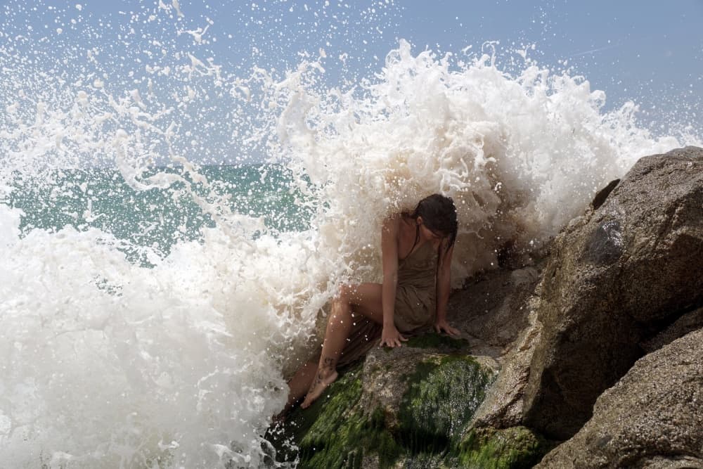Woman Against Wave by Olga Mest — canvas wall art
