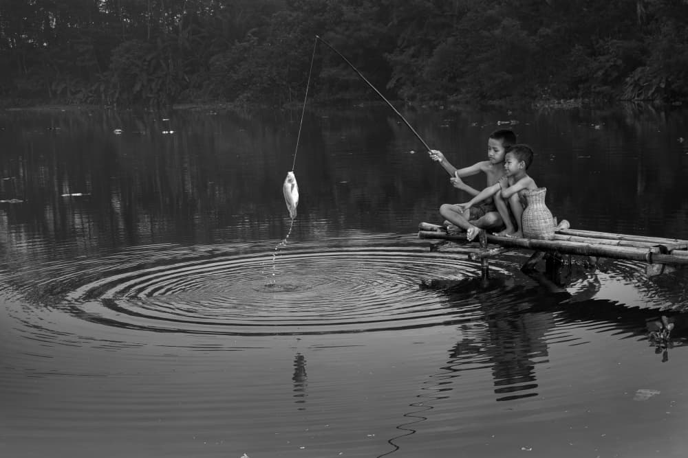 Boys Fishing by Rawisyah Aditya — canvas wall art