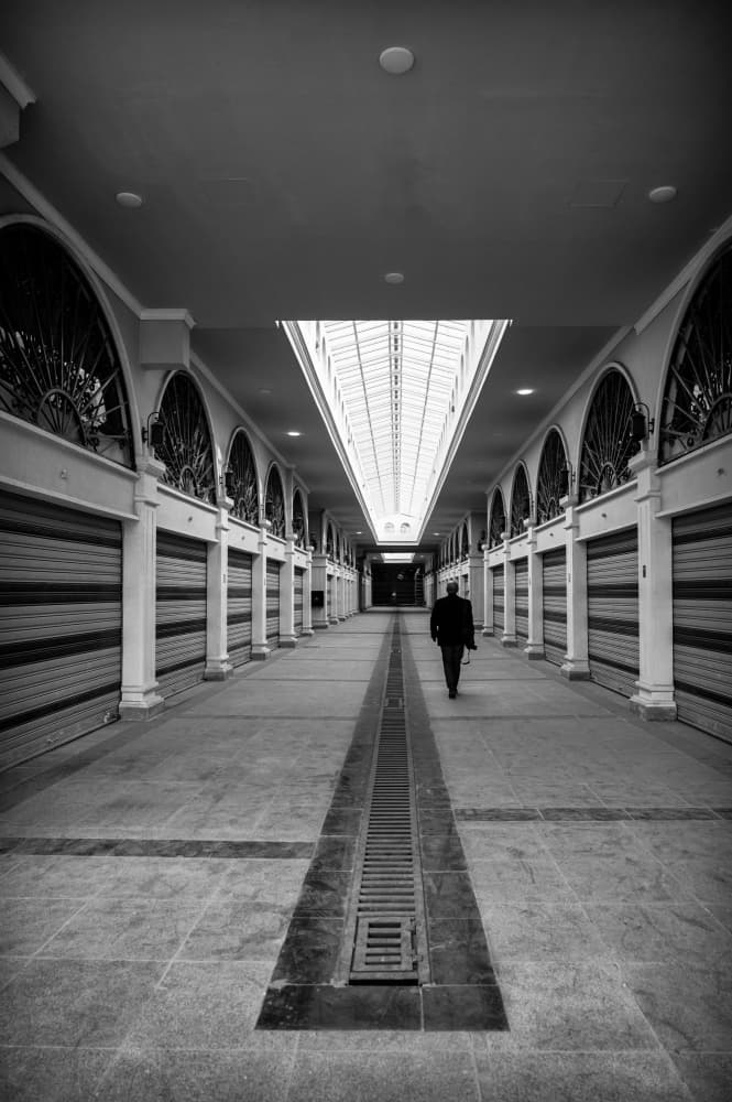 Lone Figure Arcade by Jalili — canvas wall art