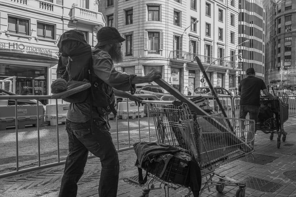 Bearded Man Pushing Cart by Wendy Fischer Hartman — canvas wall art