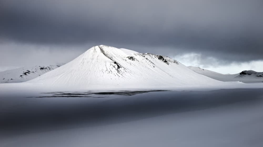 Dramatic Snowy Peak by Liloni Luca — canvas wall art