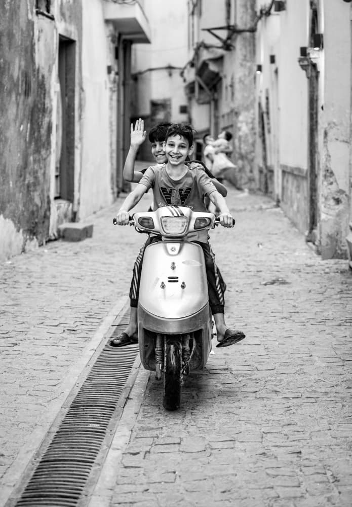 Joyful Street Ride by Bashar Alsofey — canvas wall art