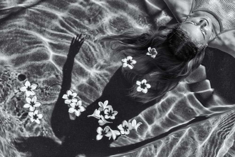 Floating Woman and Flowers by Gloria Salgado Gispert — canvas wall art