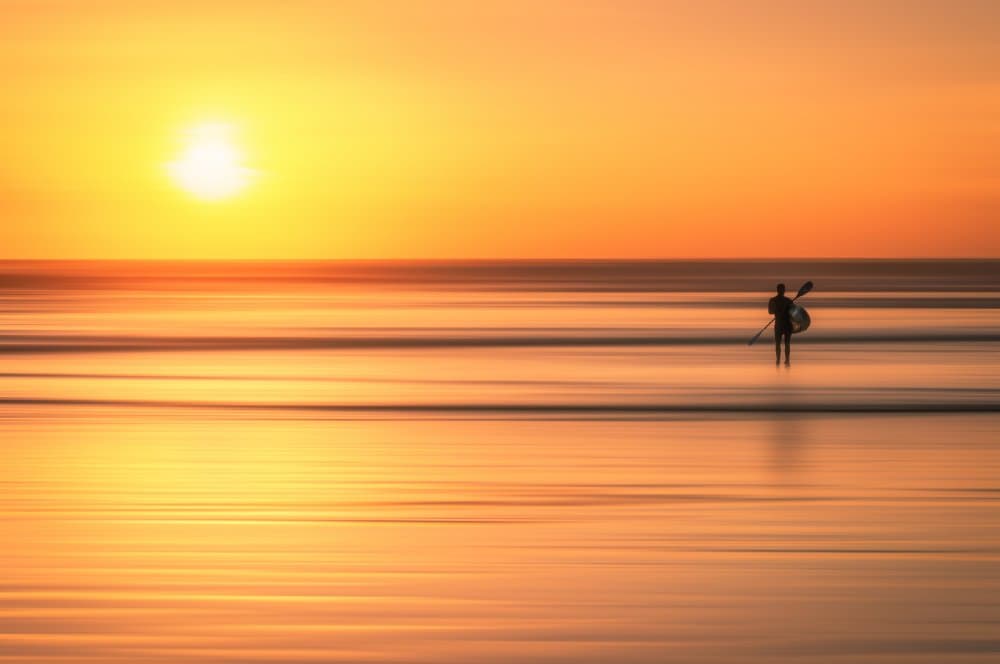Golden Sunset Paddle by Pablo Mauriz — canvas wall art