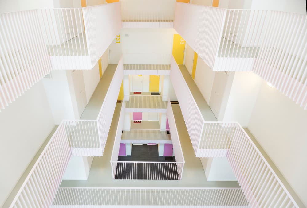 Vibrant Building Interior by Greetje van Son — canvas wall art