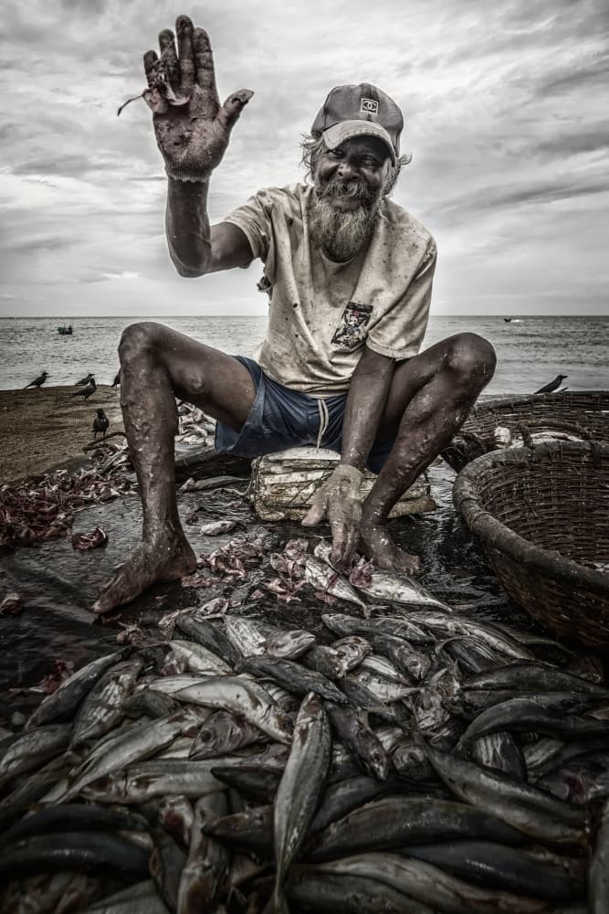 Smiling Fisherman's Catch by Pavol Stranak — canvas wall art