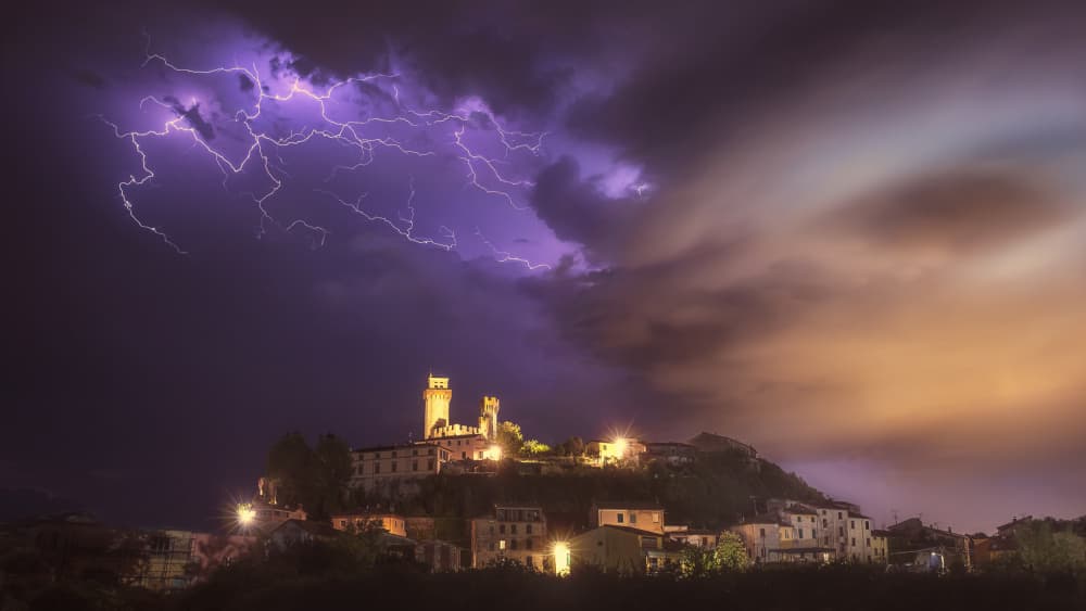 Lightning Over Hilltop Village by Paolo Lazzarotti — canvas wall art