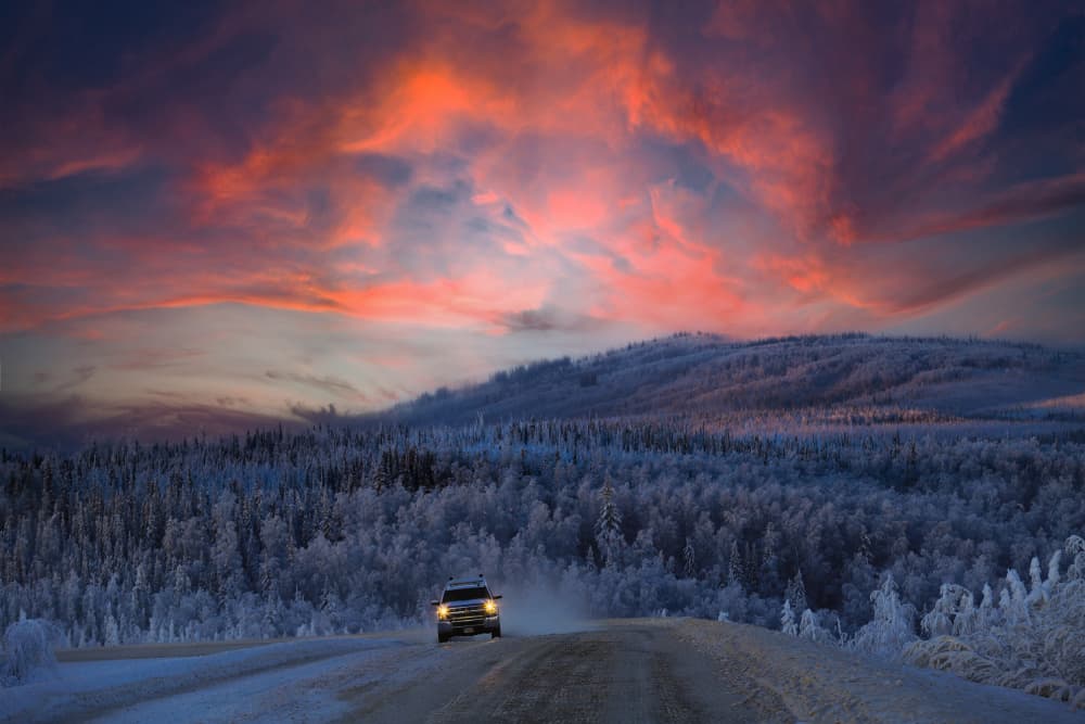Snowy Road Dramatic Sunset by Saikiran Bhagavatula — canvas wall art