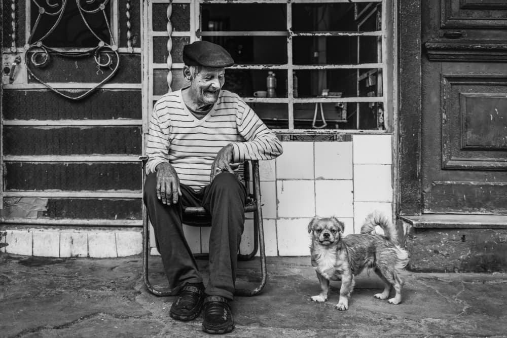 Smiling Man and Dog by Marco Tagliarino — canvas wall art