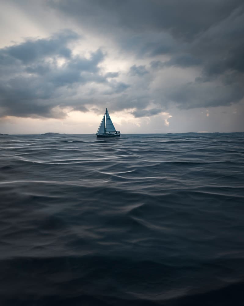 Dramatic Ocean Sailboat by Christian Lindsten — canvas wall art