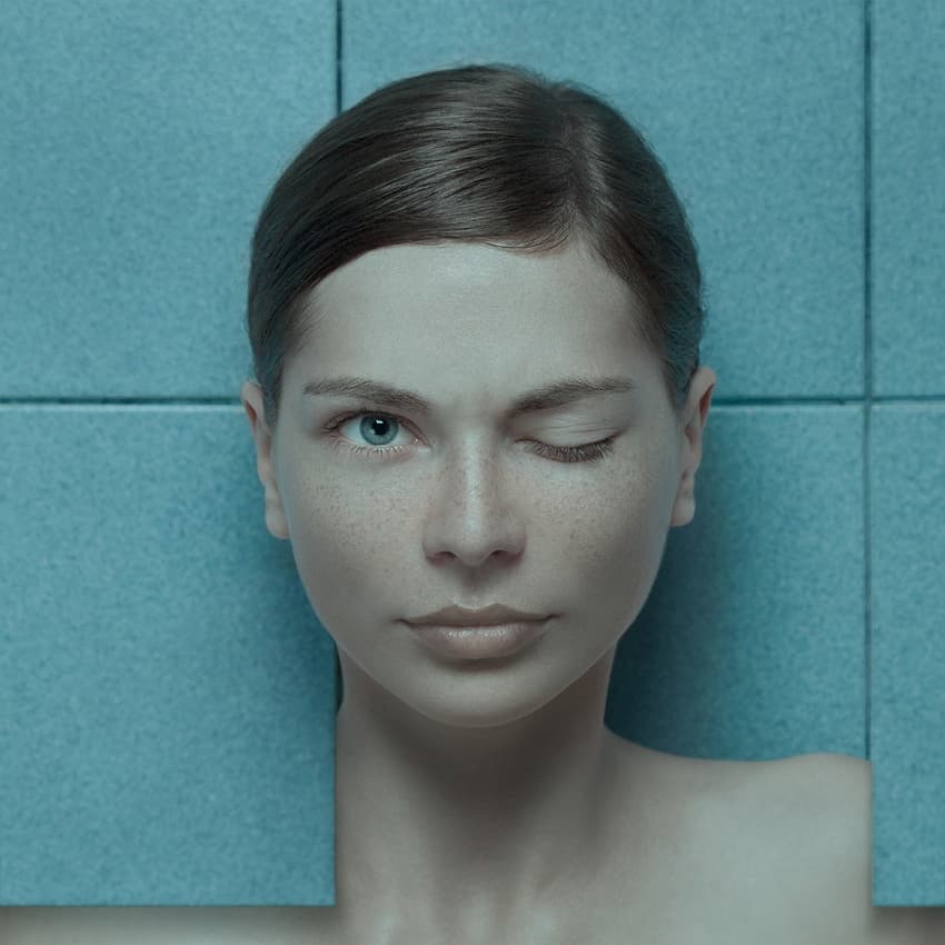 Winking Woman Portrait by Vladimir Katiev — canvas wall art