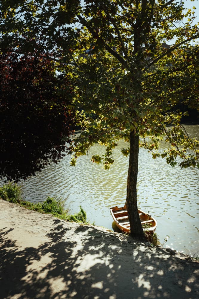 Serene River Boat by Aimee Giles — canvas wall art