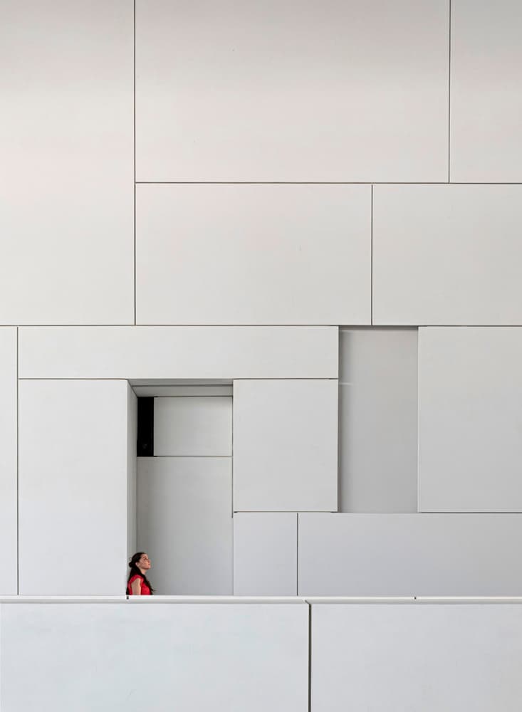 Woman in White Architecture by Karim Al Thahaby — canvas wall art