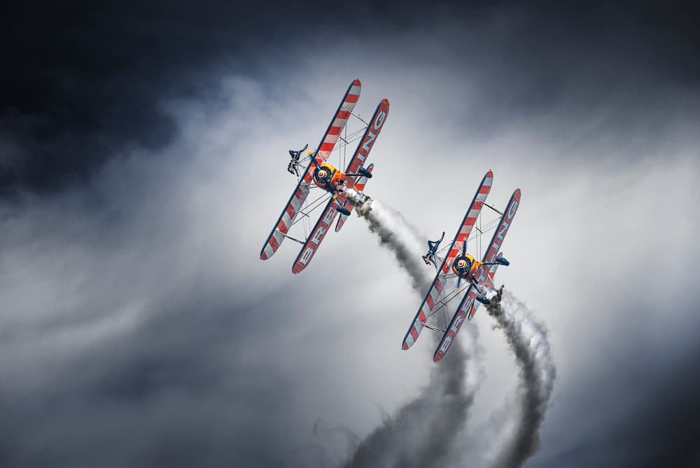 Aerobatic Biplane Performance by Leon — canvas wall art
