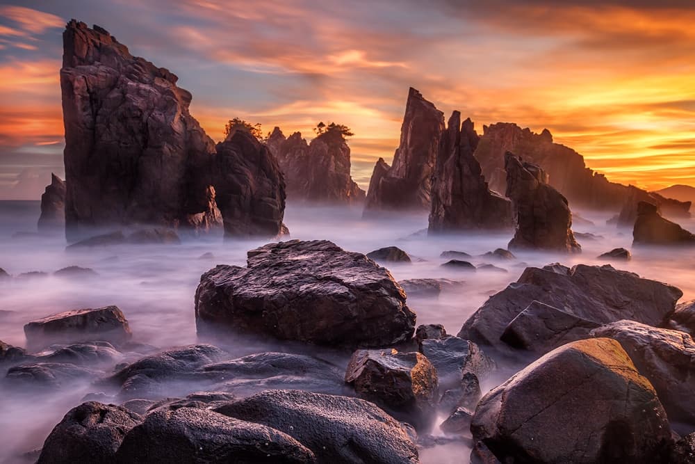 Dramatic Sea Stack Sunset by Gunarto Song — canvas wall art
