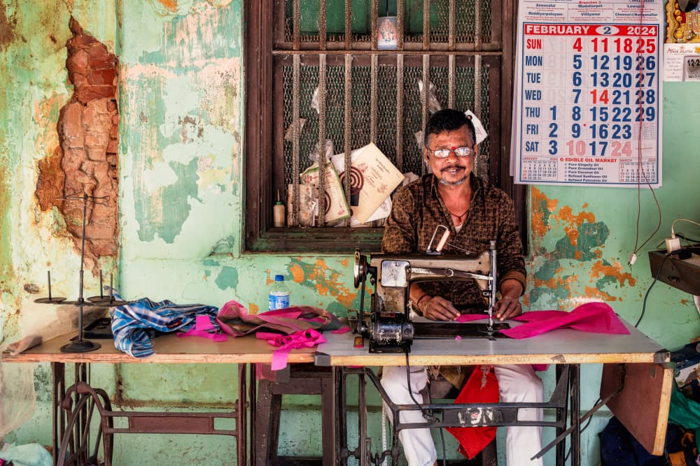 The Smiling Tailor by Martin Steeb — canvas wall art