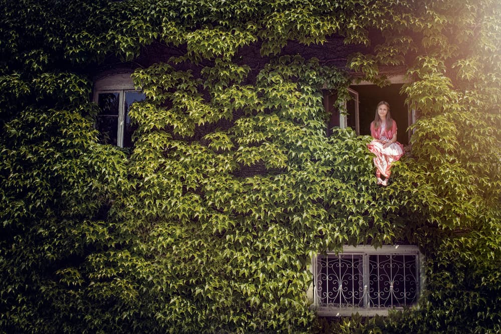 Woman In Ivy Window by Elena Karagyozova — canvas wall art