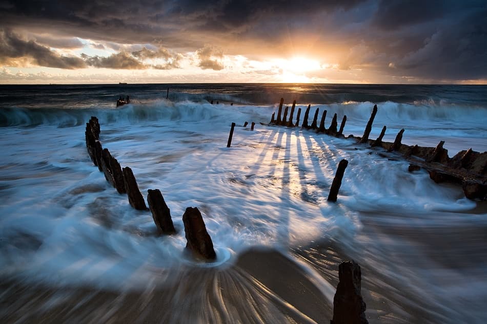 Shipwreck Sunset Waves by Mel Brackstone — canvas wall art