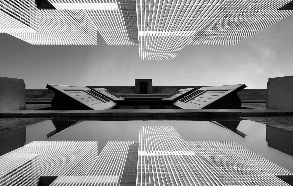 Reflected Urban Symmetry by Piet Agterhof — canvas wall art