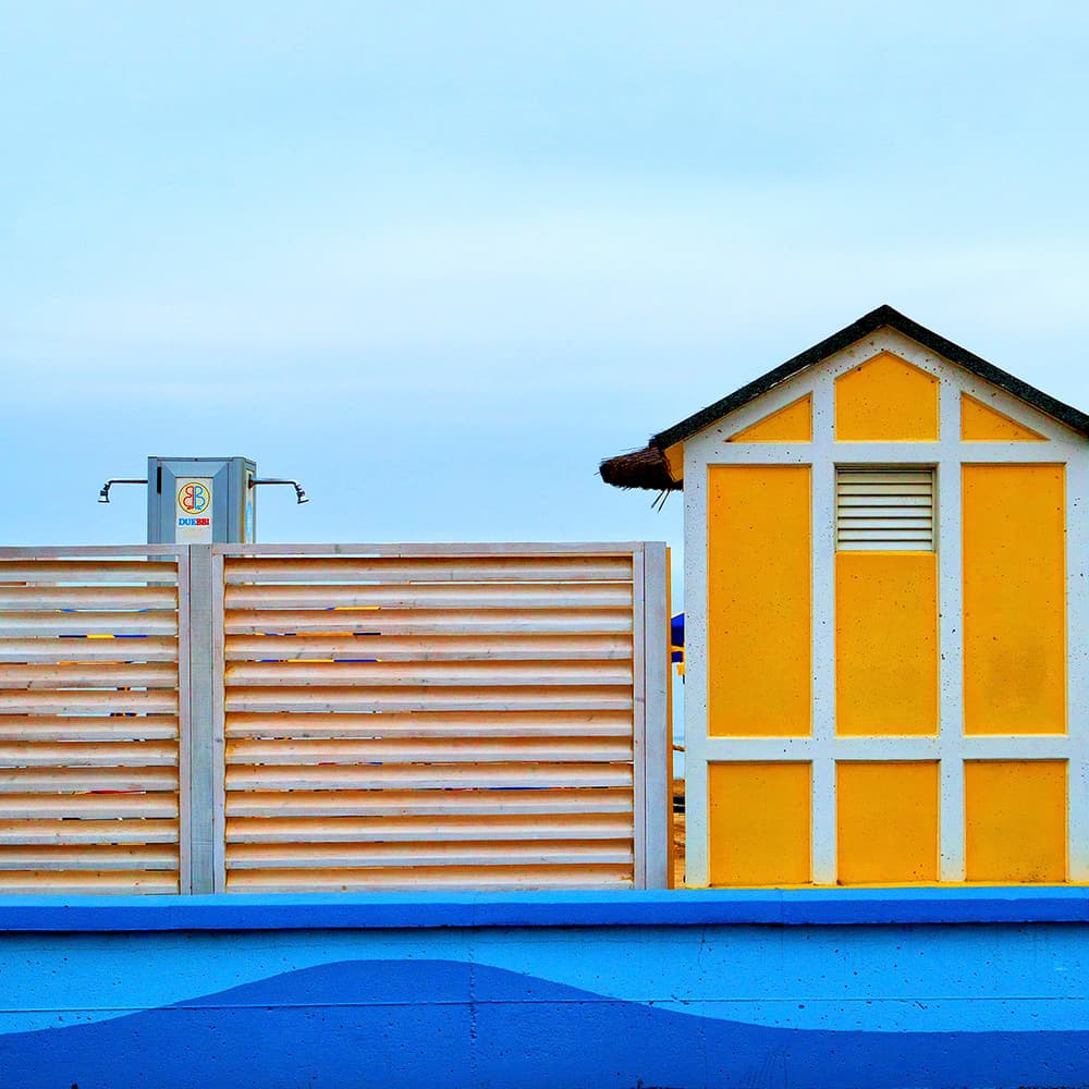 Vibrant Yellow Beach Hut by Massimo Della Latta — canvas wall art