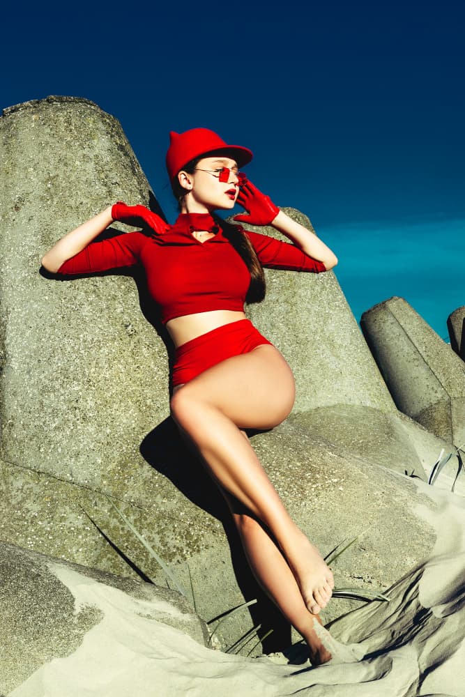Bold Red Beach Fashion by Ruslan Bolgov — canvas wall art