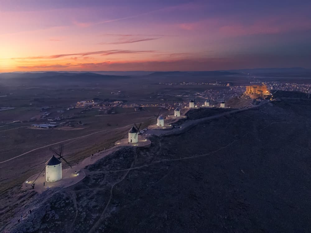 Historic Windmills Dusk by Enrique Rodriguez de Mingo — canvas wall art