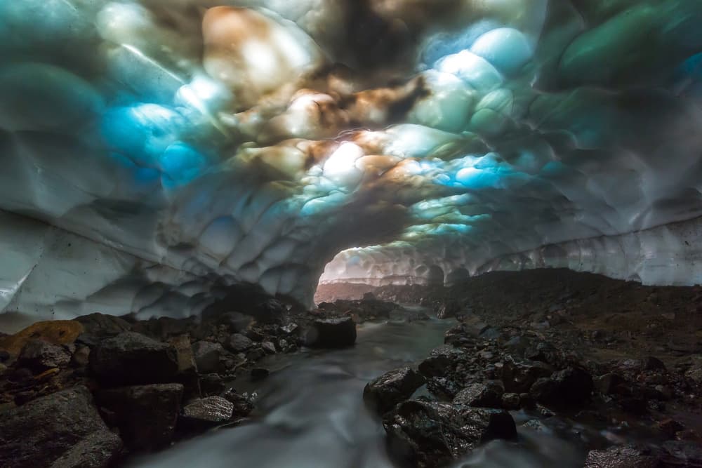Ethereal Ice Cave Stream by Denis Budkov — canvas wall art