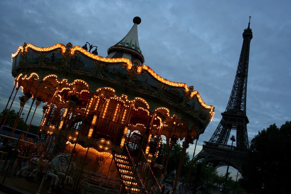 Eiffel Tower Carousel Glow by Alessio Trerotoli — canvas wall art