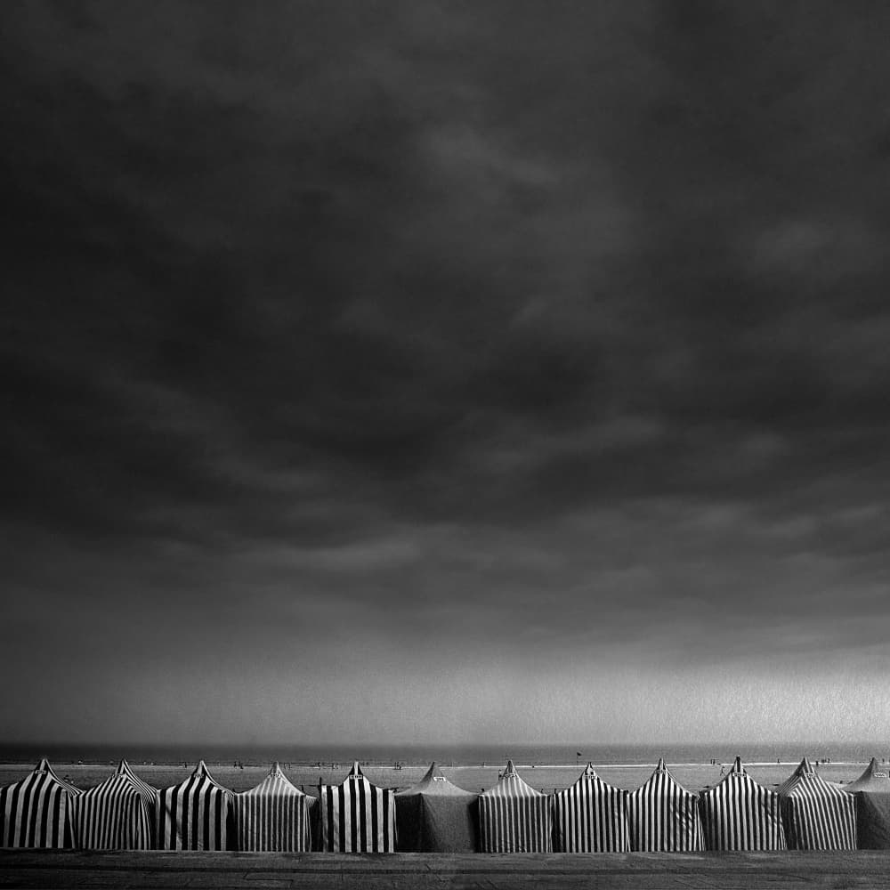 Stormy Beach Tents by Juan Antonio Palacios — canvas wall art