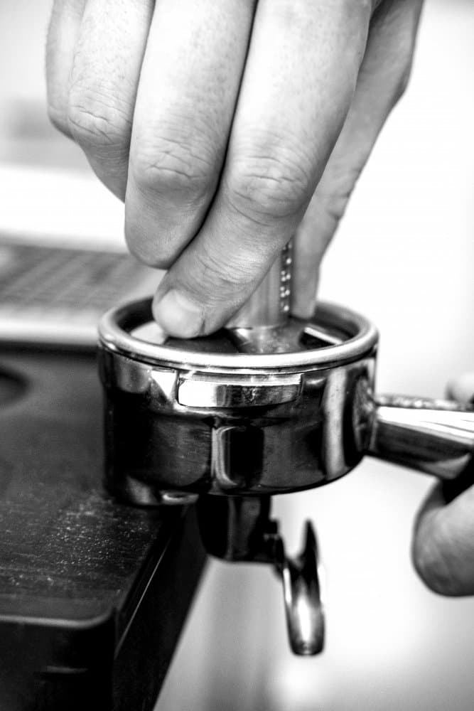 Hand Tamping Espresso by Pictufy Studio III — canvas wall art
