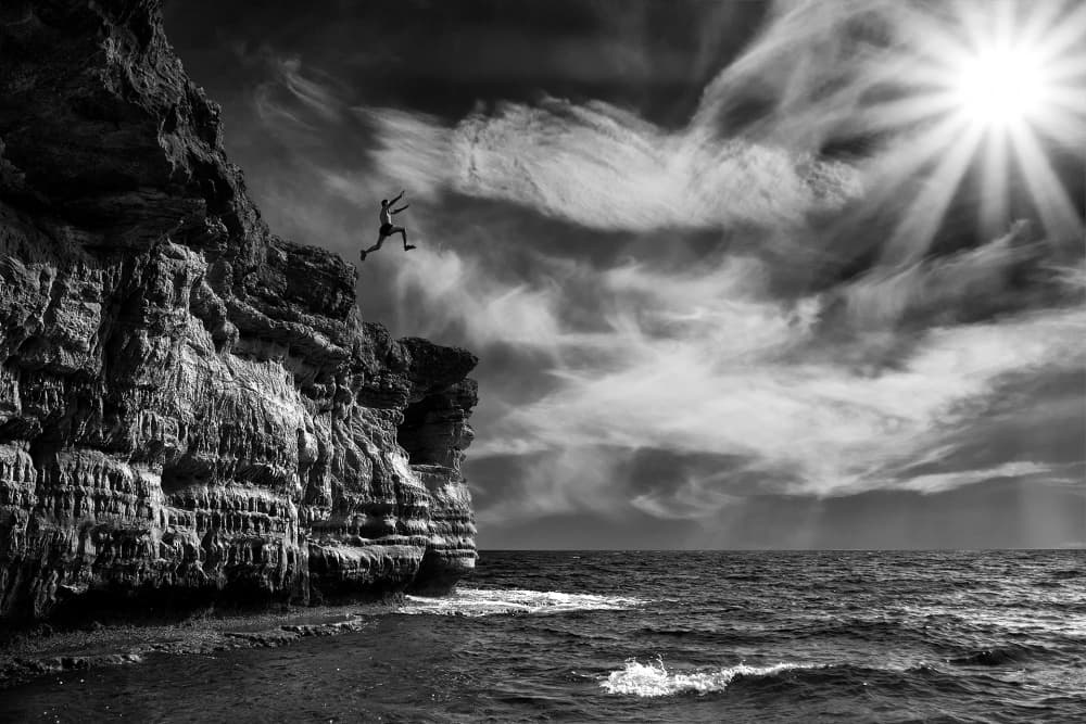 Dramatic Cliff Jump by Marcel Rebro — canvas wall art