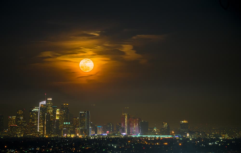 Moon Over City Lights by Eunice Kim — canvas wall art