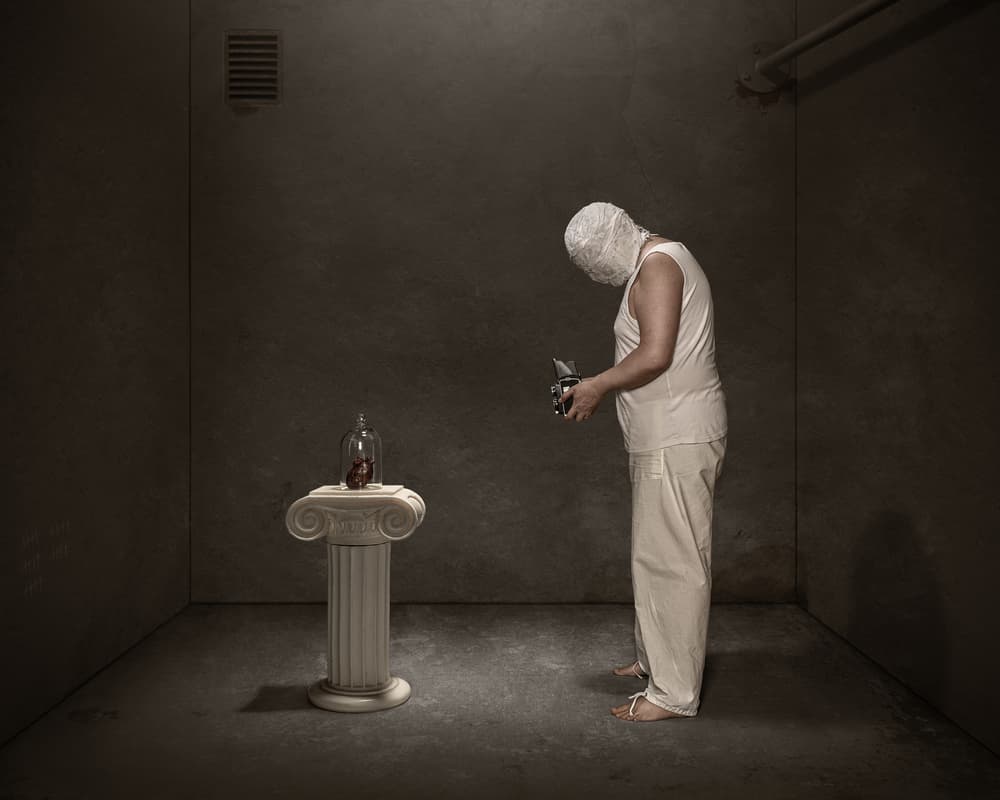 Bandaged Figure Contemplating Heart by Petri Damstén — canvas wall art