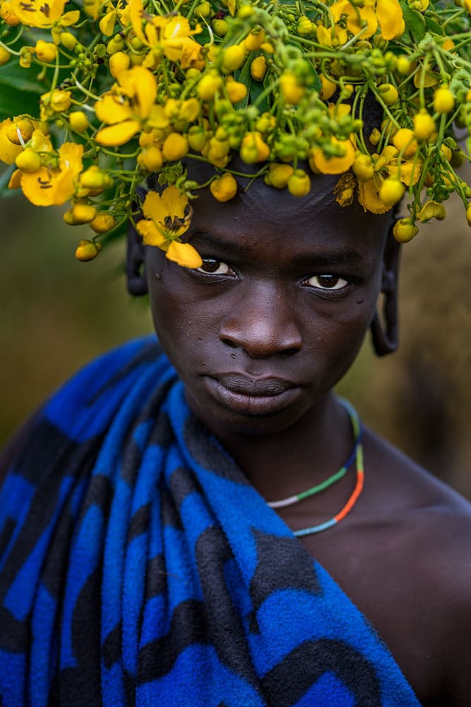 African Youth Flower Crown by Juanra Noriega — canvas wall art