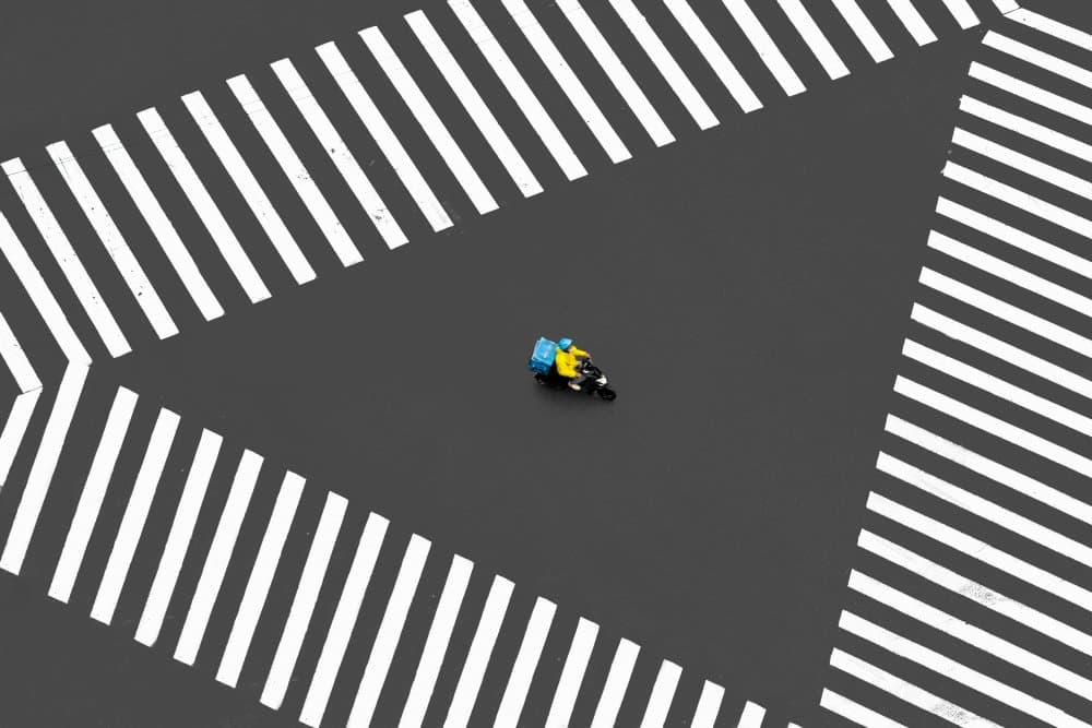 Urban Crossroads Scooter by Yifan Wu — canvas wall art