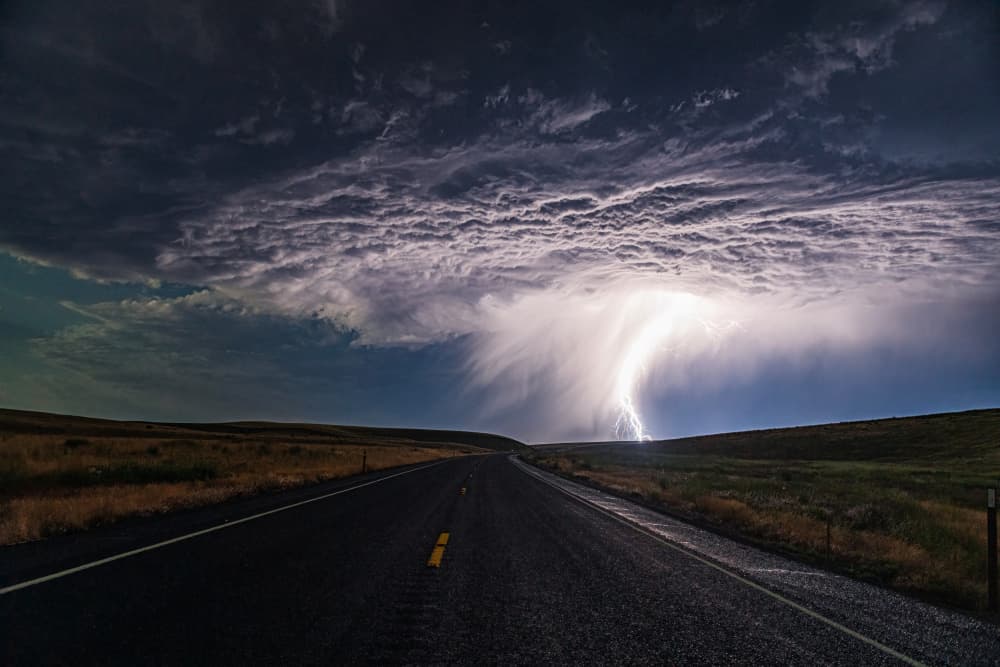 Lightning Strikes Open Road by Chuanxu Ren — canvas wall art