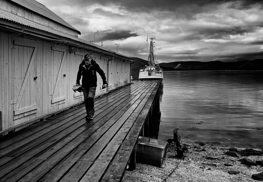 Man Walking Dockside by Julien Oncete — canvas wall art