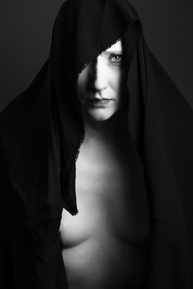 Mysterious Hooded Gaze by Hardik Pandya — canvas wall art