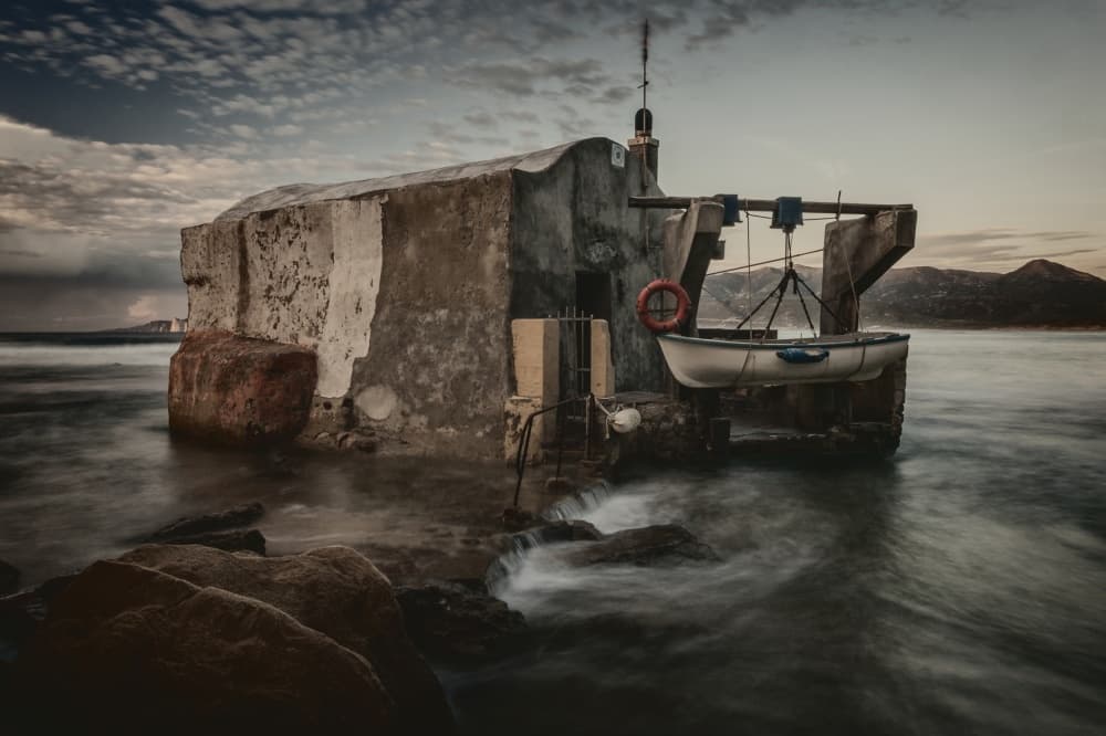 Weathered Boathouse Serenity by Pavol Stranak — canvas wall art