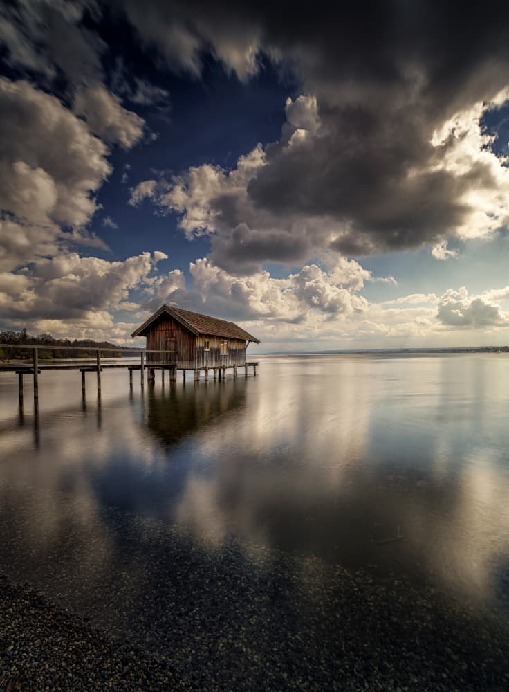 Rustic Boathouse Reflection by Ivo Mateju — canvas wall art